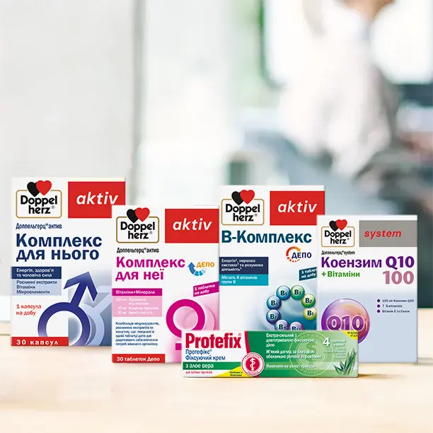 The image features several health supplement boxes from the brand Doppelherz, including products labeled for men, women, B vitamins, and Coenzyme Q10. A tube of Protefix cream is also displayed at the front. The background shows a blurred indoor setting.